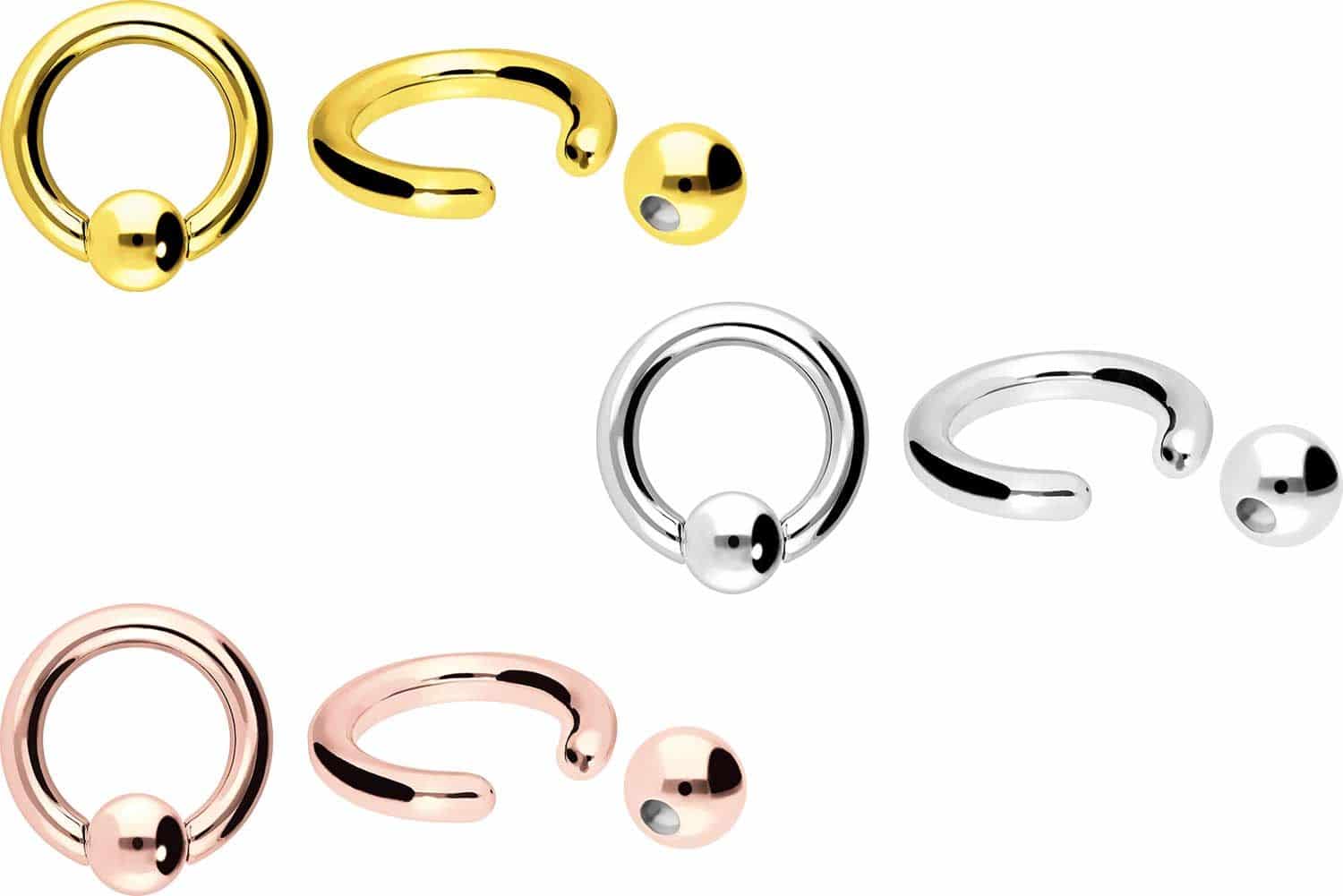 18 carat gold ball closure ring