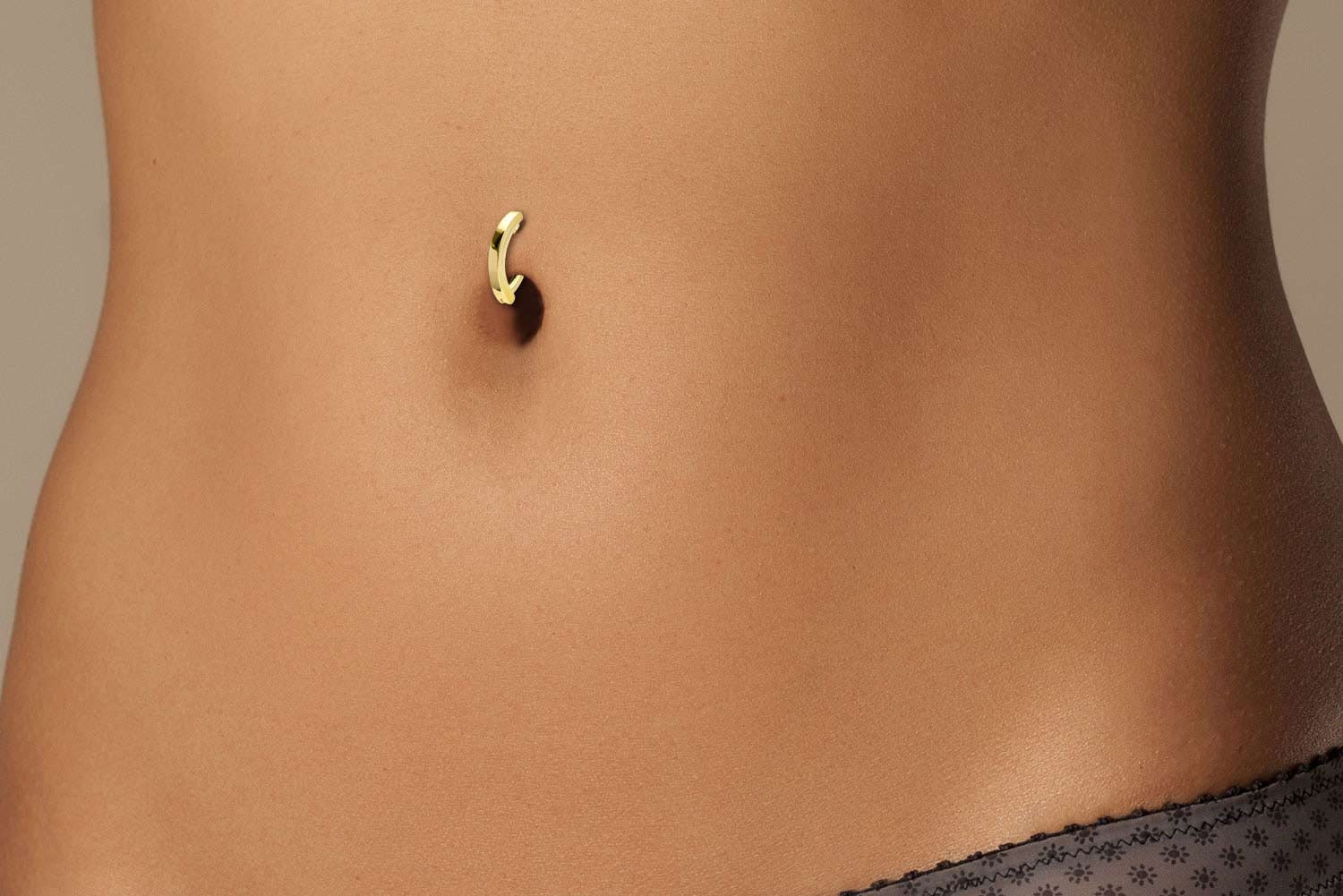 18 carat gold belly button clicker ARCH